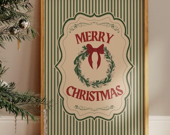 May include: A framed Christmas print with a green and white striped background. The print features the words "MERRY CHRISTMAS" in red script, a red bow, and a green wreath. The frame is a light brown color.