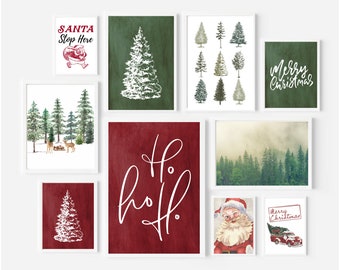May include: A collection of nine framed Christmas prints featuring a variety of winter scenes, including a snowy forest, a vintage Santa Claus, and a red truck with a Christmas tree. The prints are all in white frames and have a rustic, vintage feel.