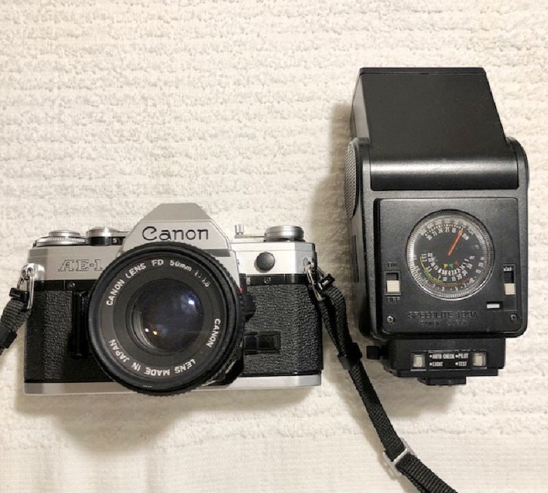Canon AE-1 Black + Lens FD 50mm F1.8 + Power Winder. Serial Number