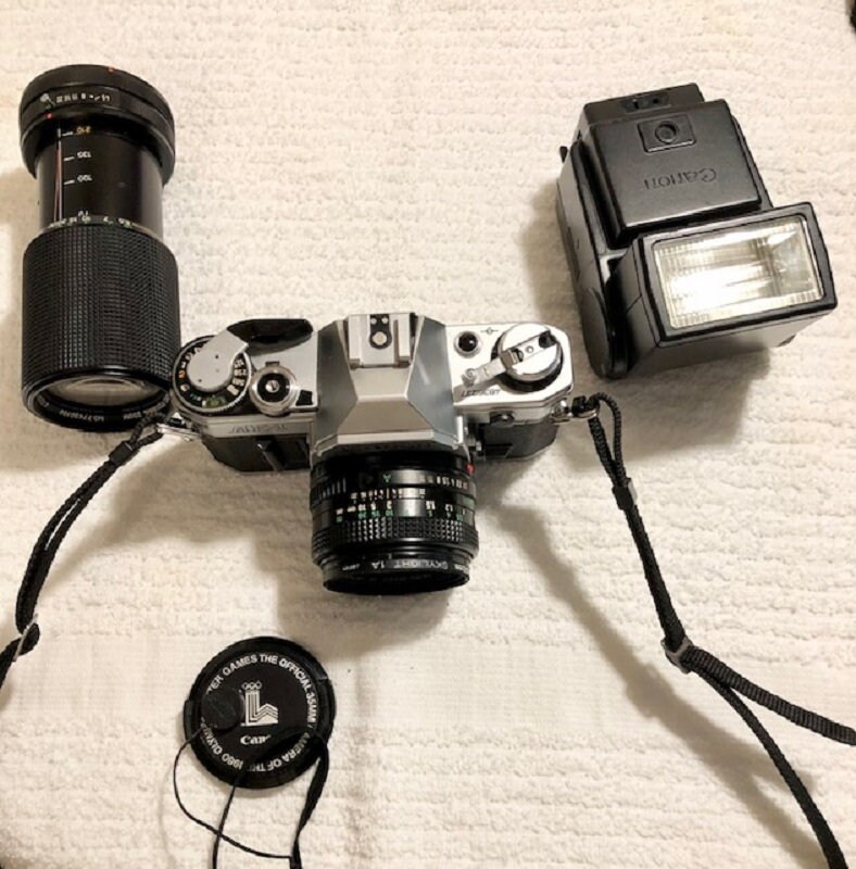 Canon AE-1 Black + Lens FD 50mm F1.8 + Power Winder. Serial Number