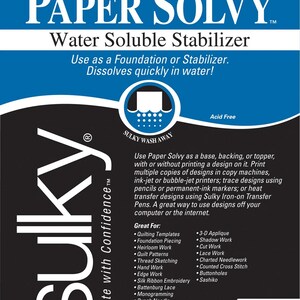 May include: Sulky Paper Solvy water soluble stabilizer in white. The packaging features blue and black text detailing its use as a foundation or stabilizer that dissolves in water. It measures 8-1/2 inches by 11 inches per sheet.