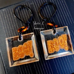 Boo! Halloween earrings.