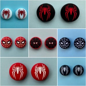 May include: Set of eight round, red and black, Spider-Man themed controller caps for gaming consoles. The caps feature different Spider-Man designs, including a spider web, a spider, and Spider-Man's mask.