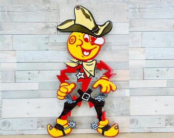 Vintage Reddy Killowat Cowboy Porcelain Sign – RK Western Wall Decor, Retro Western Wall Art (12x6.5")