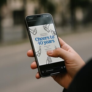 May include: A black smartphone displays a birthday invitation with the text "Cheers to 40 years" in blue. The invitation features illustrations of hands holding bottles and beer mugs. The phone is held by a person.
