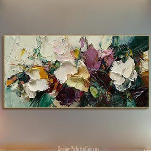 May include: Abstract painting with a colorful palette of white, green, purple, and yellow. The painting features thick brushstrokes and a textured surface. The painting is framed and hanging on a wall.