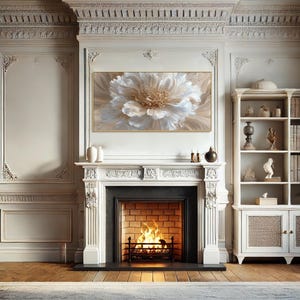 May include: A living room with a fireplace and a large floral painting. The painting features a white and gold flower. The fireplace has a black interior and a fire burning inside. A white bookshelf is to the right.