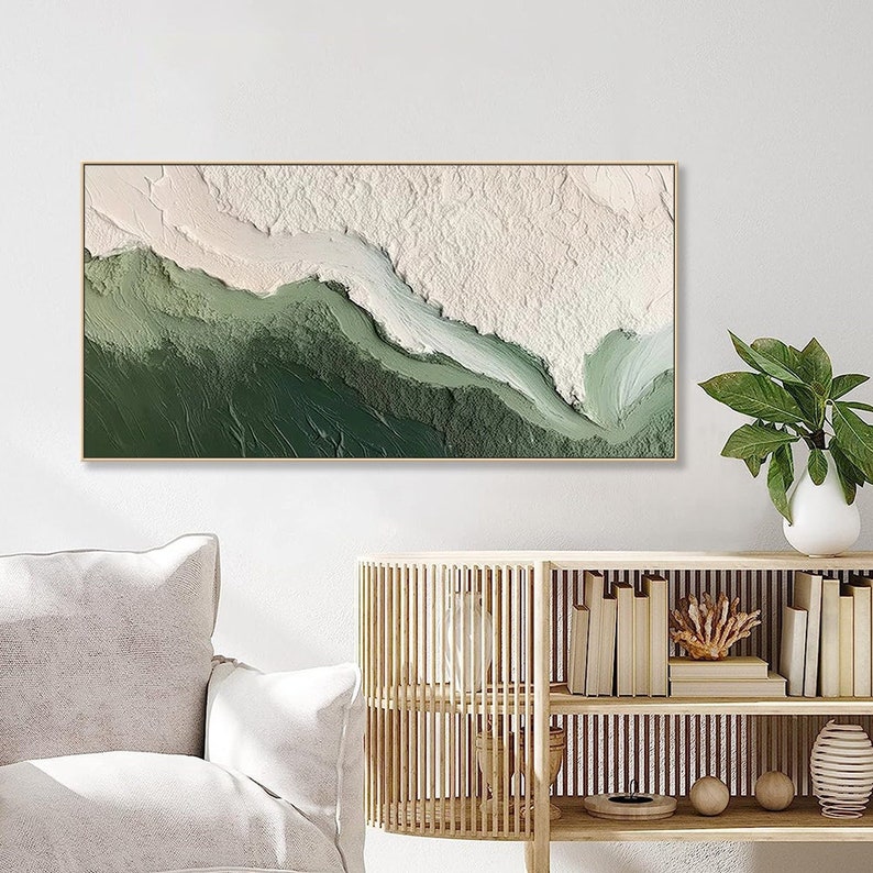 May include: Abstract painting with a white and green color scheme. The painting features a textured, layered effect with a white wave-like shape flowing through a green landscape.