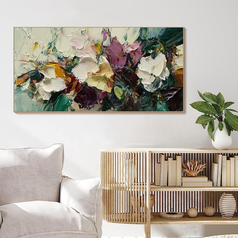 May include: Abstract painting with a floral theme. The painting features a variety of colors, including white, yellow, green, purple, and brown. The paint is applied in thick strokes, creating a textured effect.