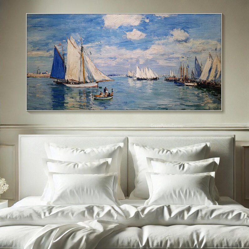May include: A large framed painting depicts a seascape with sailboats under a blue sky with fluffy white clouds. The artwork features several sailboats with white sails and blue accents, sailing on a calm, blue-green sea. A small boat with people is also visible.