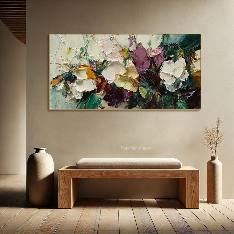 May include: Abstract painting with a colorful floral design. The painting features shades of white, pink, purple, green, and yellow. The paint is applied in thick strokes, creating a textured effect.