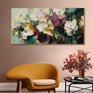 May include: Abstract painting with thick brushstrokes in shades of white, green, purple, and yellow. The painting depicts a floral arrangement with a textured, painterly style.