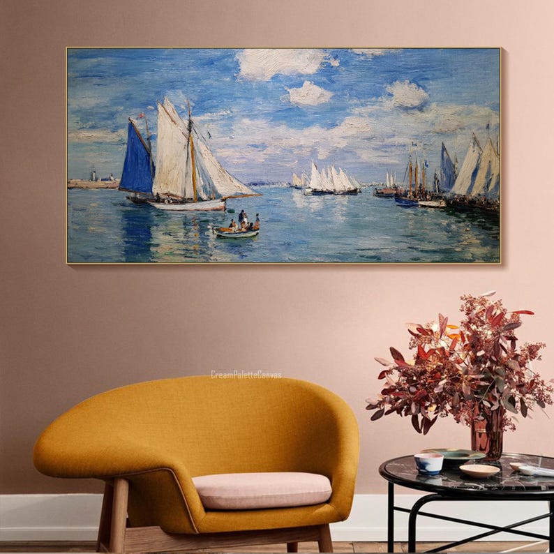 May include: A framed oil painting depicts a seascape with sailboats on the water under a blue sky with clouds. The painting features a variety of sailboats with white sails and a few with blue sails. A small boat with people is in the foreground.