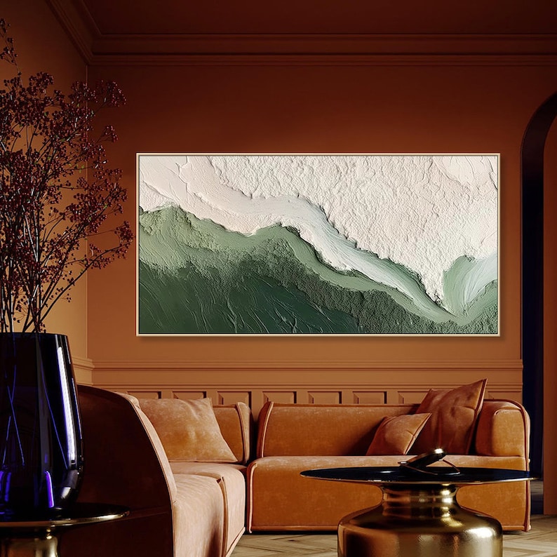 May include: Abstract painting with a green and white color scheme. The painting depicts a landscape with a flowing river or stream. The painting is framed in a gold frame and is hanging on a wall.