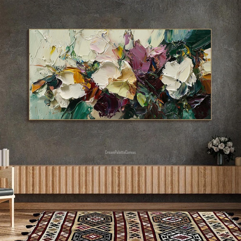 May include: Abstract painting with a textured, impasto style. The painting features a variety of colors, including white, yellow, green, purple, and brown. The colors are blended together to create a sense of movement and depth. The painting is framed in a gold frame.