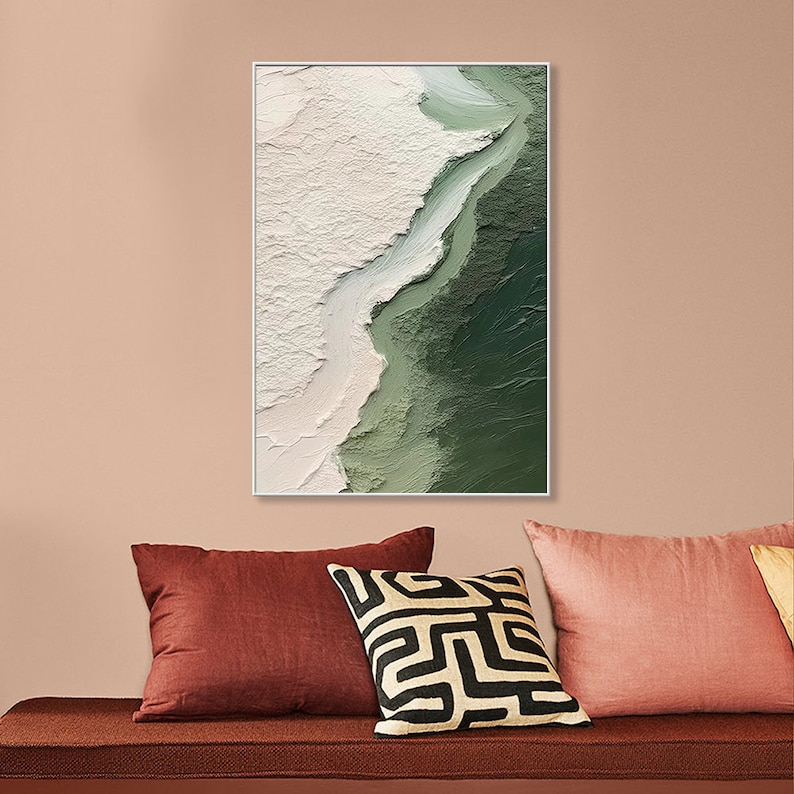 May include: Abstract painting with a white and green color scheme. The painting features a textured, abstract design with a white background and a green, flowing shape.