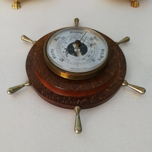 Weathermaster barometer, vintage. Nautical design, wooden ship's wheel decor. Tabletop barometer, desktop