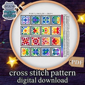 Könnte beinhalten: Ein digitaler Kreuzstichmuster-Download, präsentiert in einem hölzernen Stickrahmen. Das Design zeigt eine Reihe farbenfroher, geometrischer Muster, zusammen mit einer Temperaturtabelle in Fahrenheit. Der Text lautet "Portland, OR 2024".