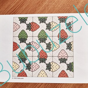 May include: A printable digital download of a strawberry pattern. The pattern features a grid of strawberries with green, red, pink, and yellow colours. The pattern is perfect for crafting projects, such as quilting, scrapbooking, and fabric design.