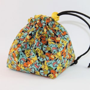 Pokémon Starters Reversible Stand Up Bag für Würfel, Reisen, Schmuck, Karten