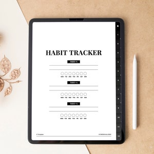 May include: A black and white digital habit tracker on a tablet with a white stylus. The tracker has three sections for different habits, each with a space for seven days of the week. The text "HABIT TRACKER" is at the top of the page.