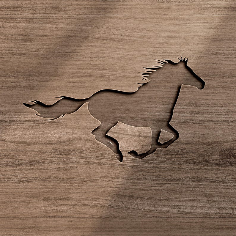 May include: A dark brown wooden panel featuring a cutout silhouette of a galloping horse. The horse is depicted in profile, facing right, with a flowing mane and tail. The wood grain is visible throughout the surface, creating a natural texture.