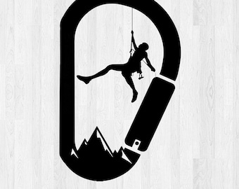 May include: Black silhouette of a person rock climbing inside a carabiner with a mountain range in the background.