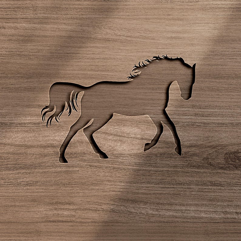May include: A dark brown wooden panel featuring a laser-cut silhouette of a horse in motion. The cutout reveals the horse's form against the grain of the wood, showing a flowing mane and tail with a distinct, sharp outline of the animal's body.