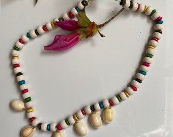 Cowrie shell necklace  with the multi colored wood beads Handmade Cowrie shell necklace, Seashell jeweler, Beach jeweler, Handmade