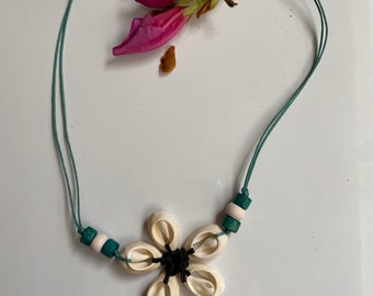 Cowrie shell with the wood beads Handmade Cowrie shell necklace, Seashell  jeweler, Beach jeweler, Handmade