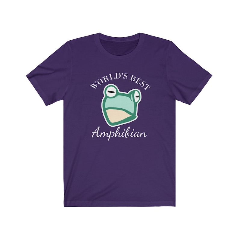 May include: Purple t-shirt with a green frog illustration and the text "World's Best Amphibian".