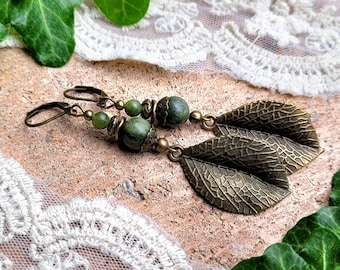 Long hanging earrings in antique bronze with green jade beads and large leaf pendant