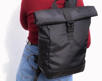 Rucksack rolltop for a laptop for the city / Backpack for men and women for travel for sport