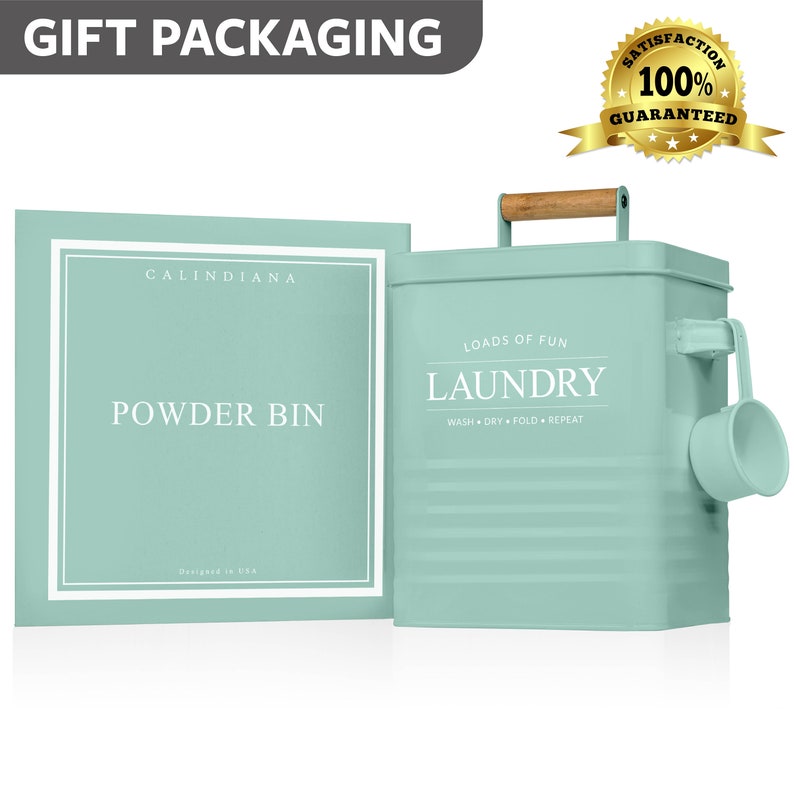 May include: A light blue metal laundry detergent container with a wooden handle and a scoop. The container has the words "Loads of Fun" and "Laundry" printed on it. The container is labeled "Calindiana Powder Bin".
