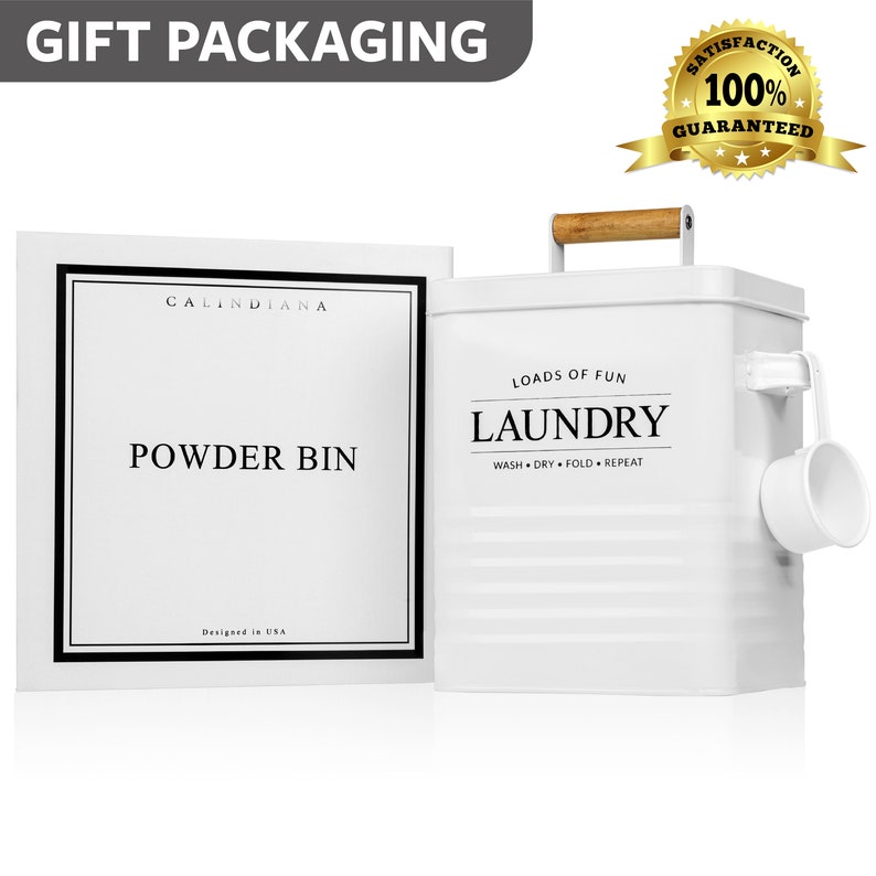 May include: White metal laundry powder bin with a wooden handle and a scoop. The bin has the text "Loads of Fun Laundry Wash Dry Fold Repeat" printed on the front. The bin is packaged in a white box with the text "Calindiana Powder Bin Designed in USA" printed on the front.