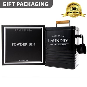 May include: Black metal laundry powder bin with a wooden handle and a scoop. The bin has white text that reads "Loads of Fun Laundry Wash Dry Fold Repeat". The bin is packaged in a black box with white text that reads "Calindiana Powder Bin Designed in USA".