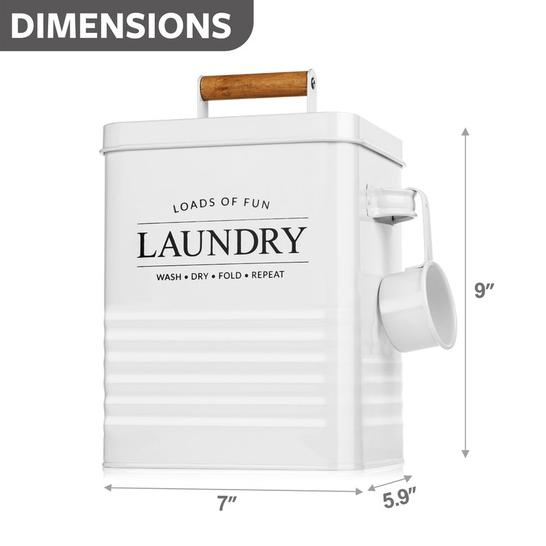 May include: White metal laundry bin with a wooden handle and a scoop on the side. The bin is 9 inches tall, 7 inches wide, and 5.9 inches deep. It has the text "Loads of Fun Laundry Wash Dry Fold Repeat" printed on the front.