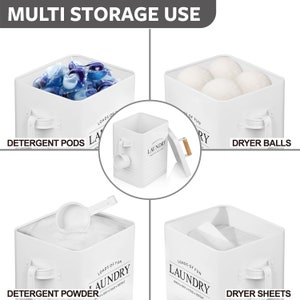 May include: Four white metal containers with lids and a scoop. Each container has the word "Laundry" printed on the front and is filled with different laundry items. The containers are labeled "Detergent Pods", "Detergent Powder", "Dryer Balls", and "Dryer Sheets".