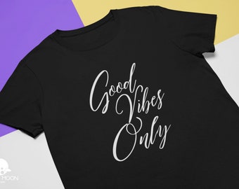 May include: Black t-shirt with white text that reads "Good Vibes Only".