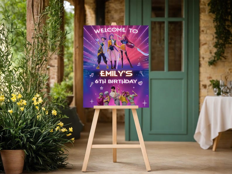 May include: A wooden easel displays a colorful birthday sign. The sign reads "WELCOME TO EMILY'S 6TH BIRTHDAY" with a vibrant graphic of people and musical notes. The background is a gradient of purple and pink.