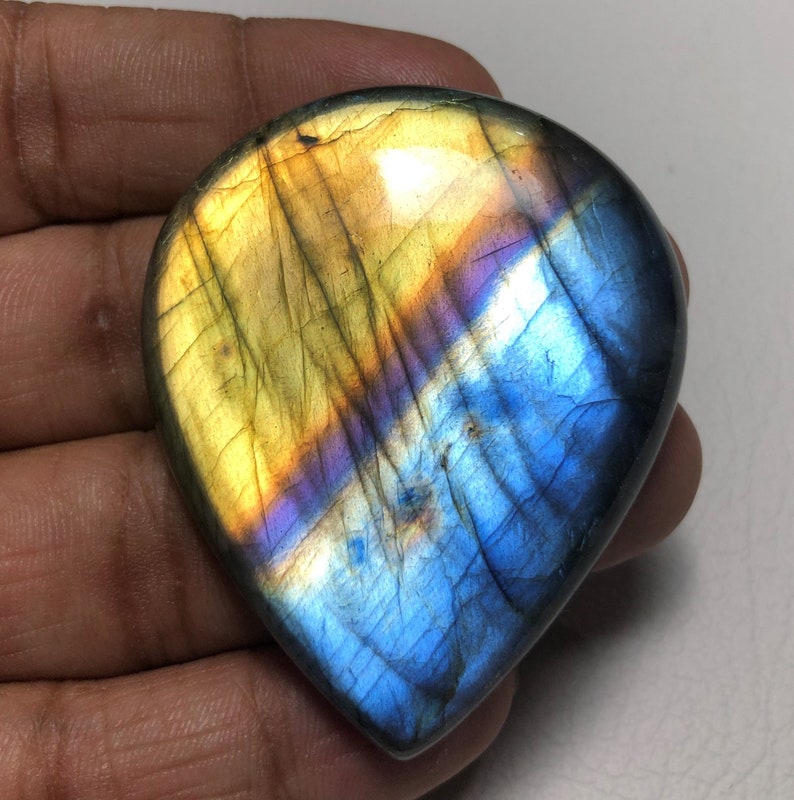 Big Multi-purple Fire Labradorite Gemstone For Jewelry Use Alluring Golden Blue-Purple Labradorite Cabochon 149.80Ct Pear Shape 52X43X8 MM