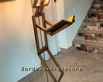 Wooden floor lamp with a design featuring a little man, 100% handcrafted.