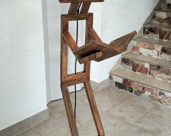 Wooden floor lamp with a design featuring a little man, 100% handcrafted.