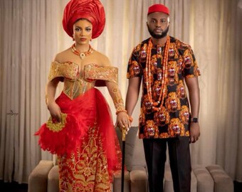 Red ISI Agu men’s clothing, African Igbo couples, red dress, African wedding dress, auto gele , hat, cap