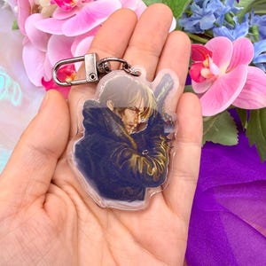 Leon S. Kennedy Resident Evil Requiem Acrylic Charm – RE9 Keychain, Fan Art Keyring, Gift for Gamers