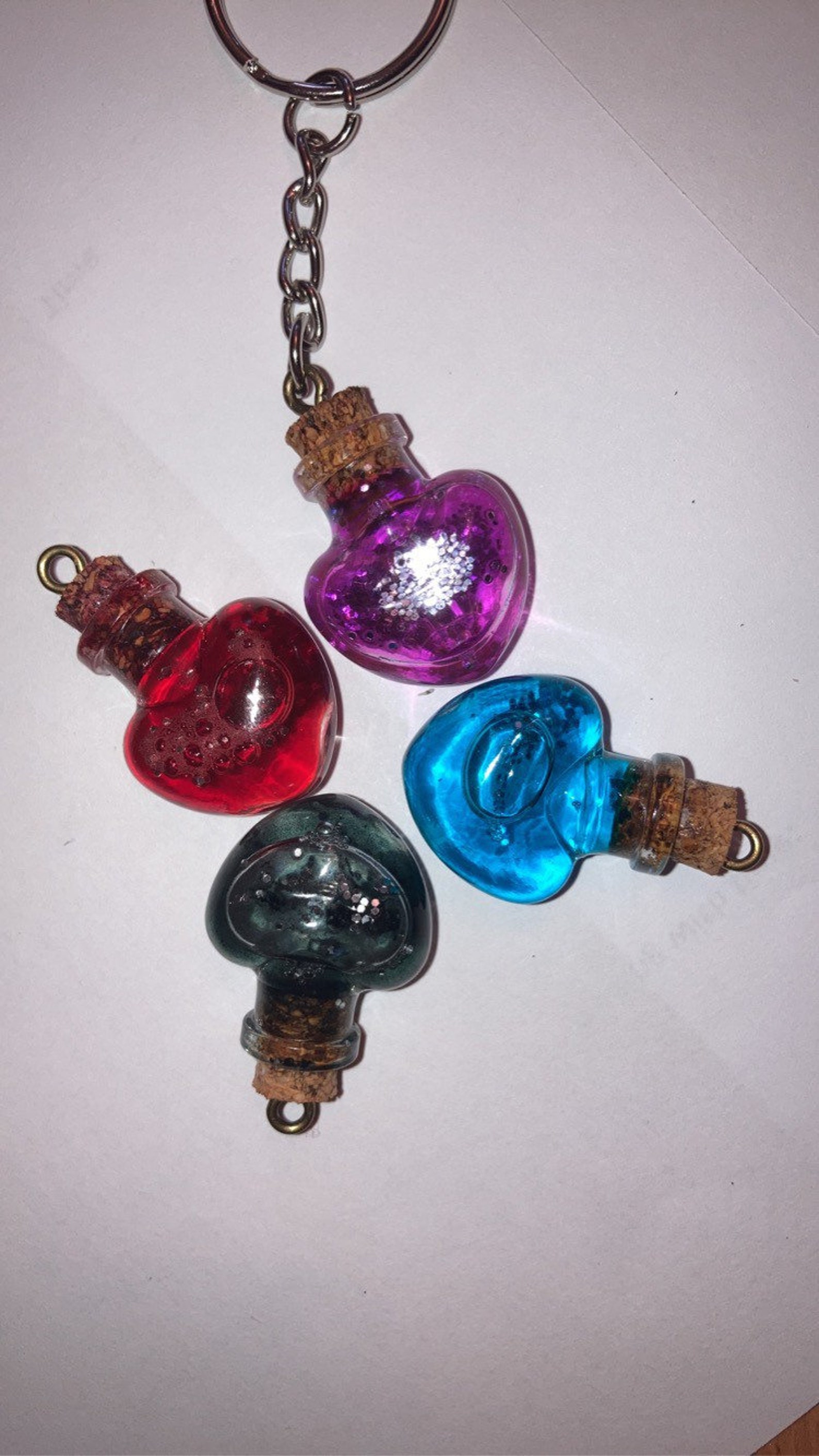 Potion bottle necklaces and keychains Etsy