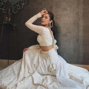 White Colored Faux Georgette Designer Lehenga Choli main image 0