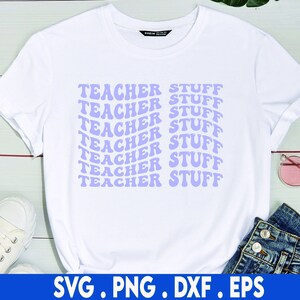 May include: White t-shirt with the text "TEACHER STUFF" repeated in a purple retro font.