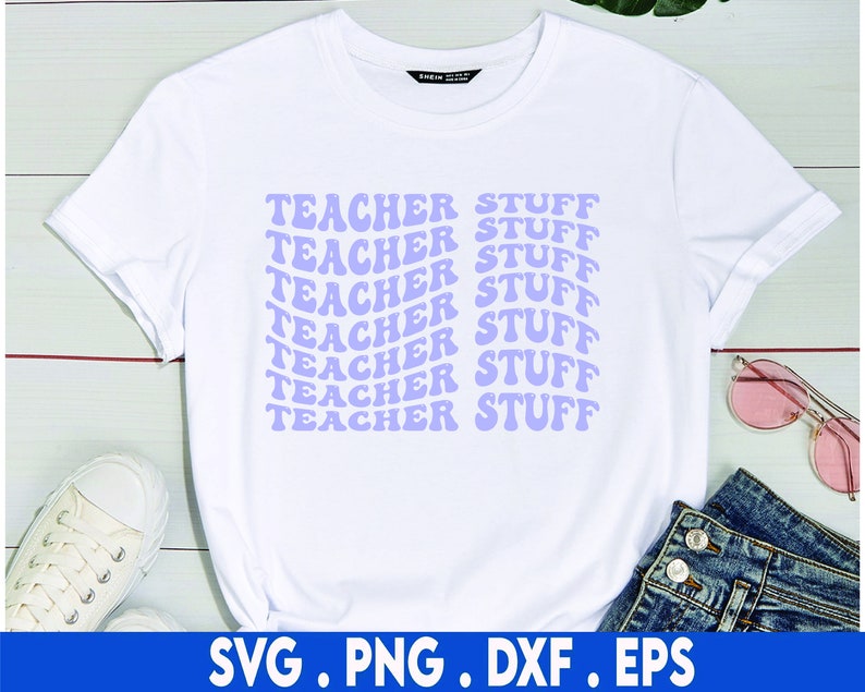 May include: White t-shirt with the text "TEACHER STUFF" repeated in a purple retro font.