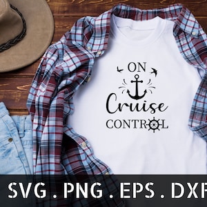 May include: White t-shirt with black text that reads "On Cruise Control" with an anchor and a steering wheel graphic.